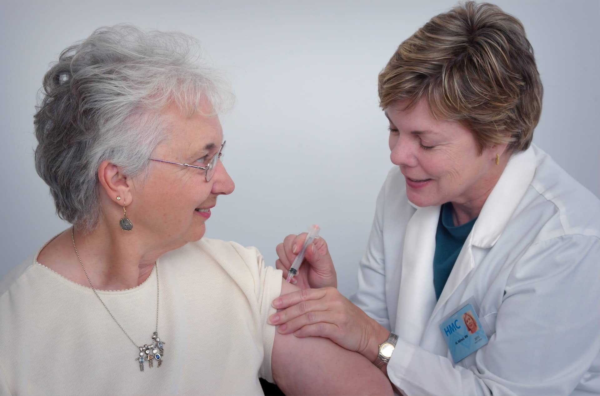 Nursing Giving Injection To Patient